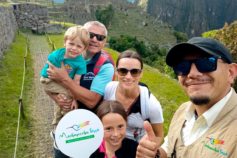 Family exploring Machu Picchu